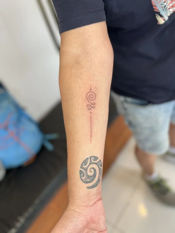abstract minimalist deity fine line wave dotwork soft shading linework tattoo Canggu Bali