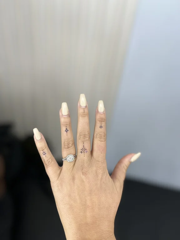 abstract minimalist hand fine line elegant minimal spiritual thin line tattoo Canggu Bali