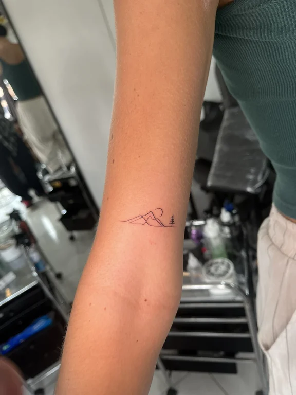abstract minimalist hand fine line minimal bold line wave thin line tattoo Canggu Bali