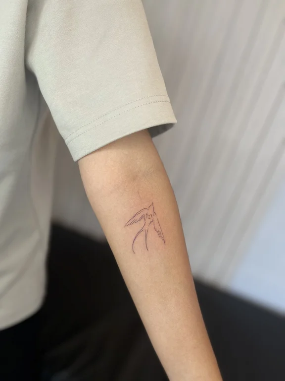 abstract minimalist hand fine line minimal elegant bold line wave tattoo Canggu Bali