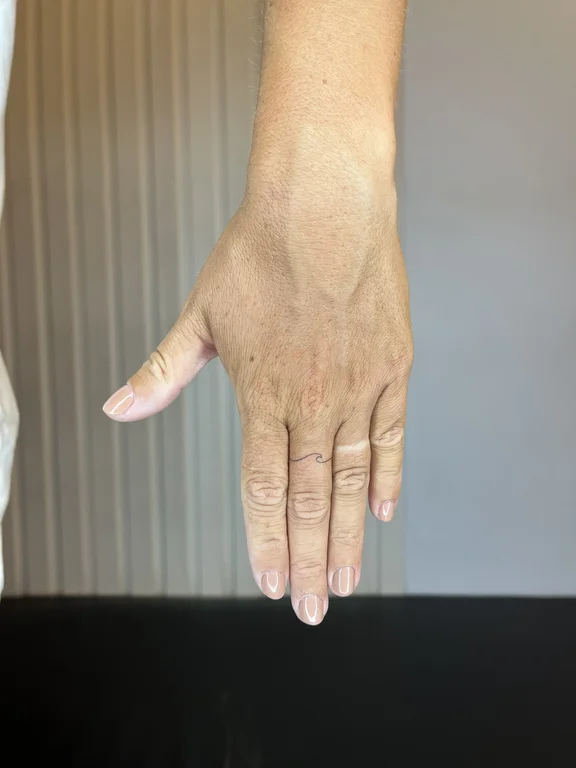 abstract minimalist hand fine line minimal soft shading thin line bold line tattoo Canggu Bali