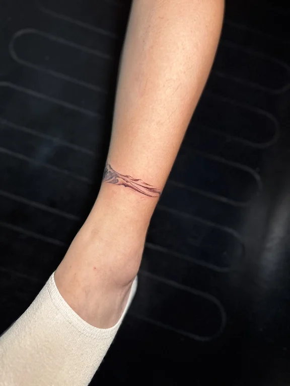 abstract minimalist hand fine line minimal thin line bold line wave tattoo Canggu Bali