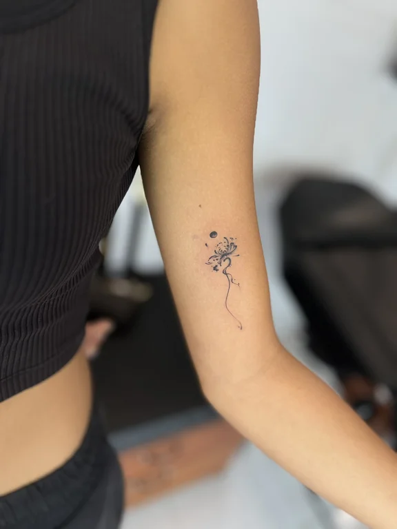 abstract minimalist lotus dotwork elegant fine line soft shading minimal tattoo Canggu Bali