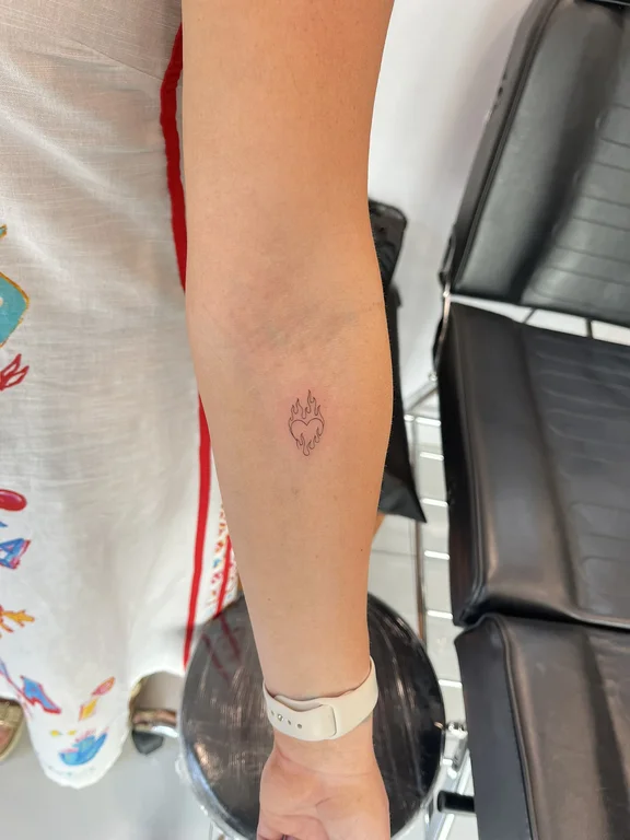 abstract minimalist lotus fine line sun leaf minimal dotwork tattoo Canggu Bali