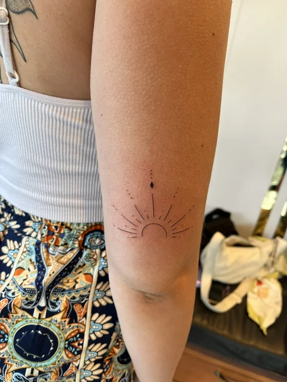 abstract minimalist lotus fine line sun minimal spiritual dotwork tattoo Canggu Bali