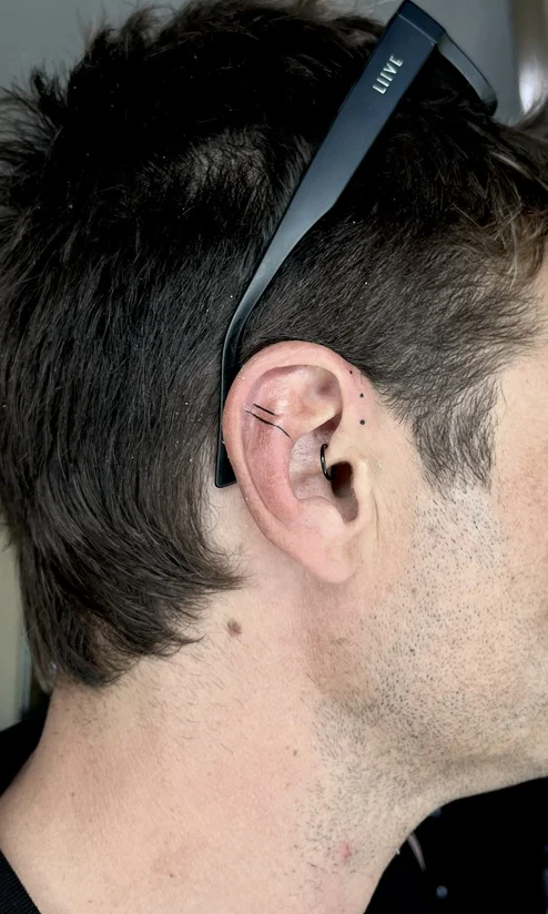 man small abstract minimalist ear fineline fine line linework line tattoo canggu bali