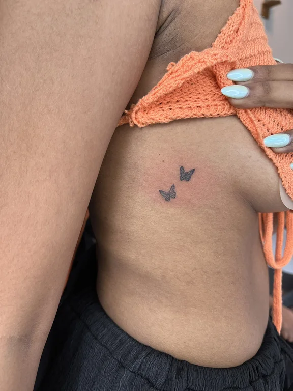 symbol minimalist butterfly fine line minimal elegant soft shading leaf tattoo Canggu Bali