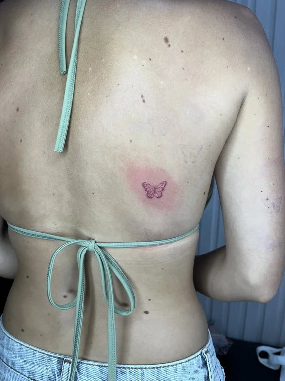 symbol minimalist butterfly fine line minimal soft shading bold line elegant tattoo Canggu Bali