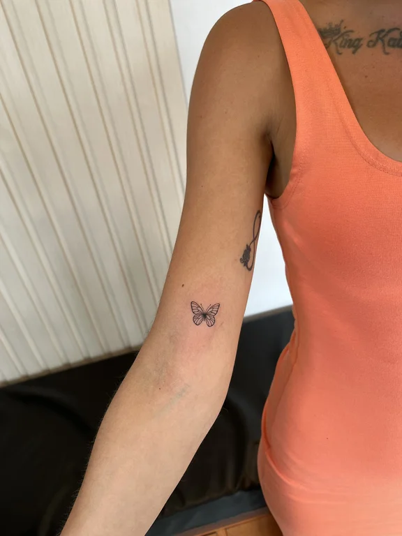 animal minimalist butterfly soft shading minimal elegant fine line linework tattoo Canggu Bali