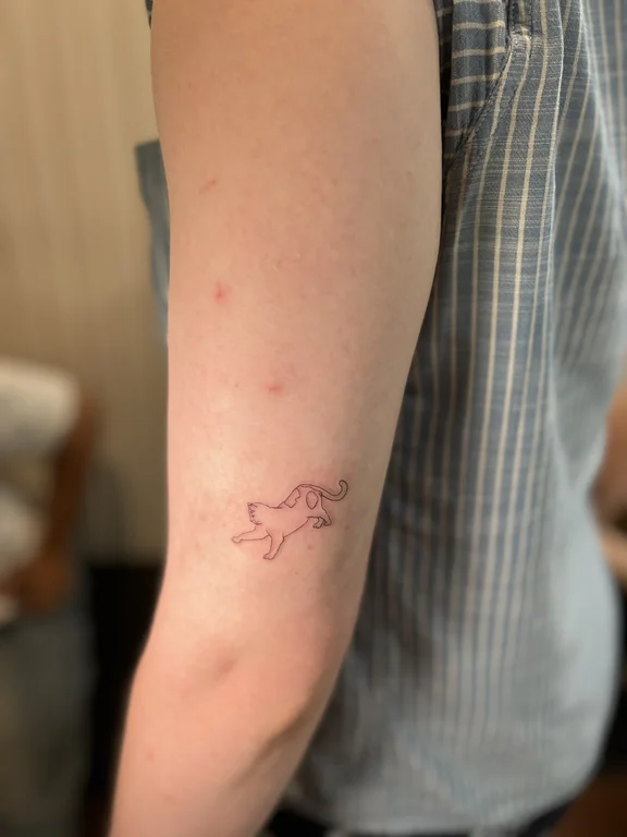 animal minimalist koi fine line minimal cloud wave linework tattoo Canggu Bali