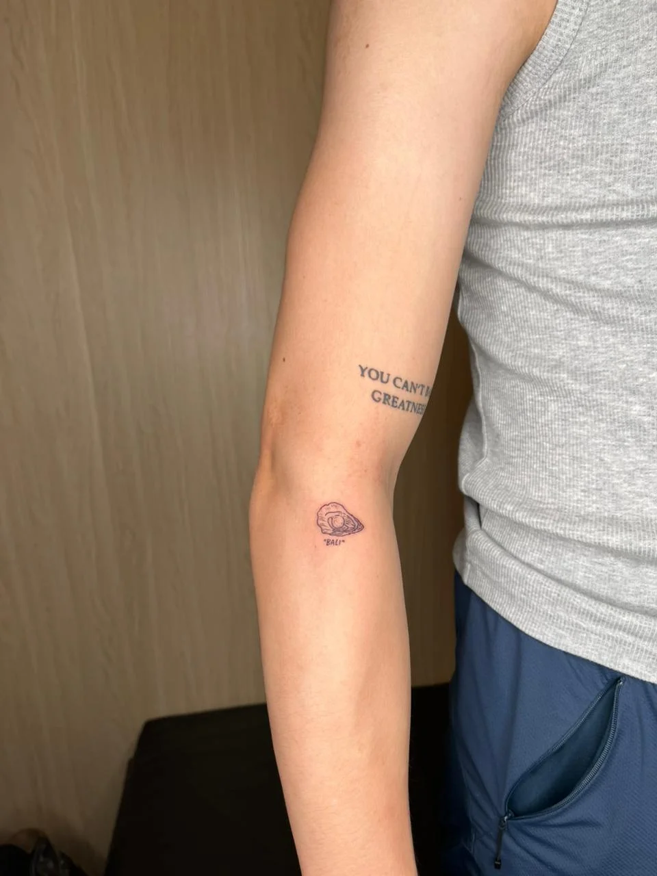 man hand shell animal small minimalist fine line line work line tattoo canggu bali