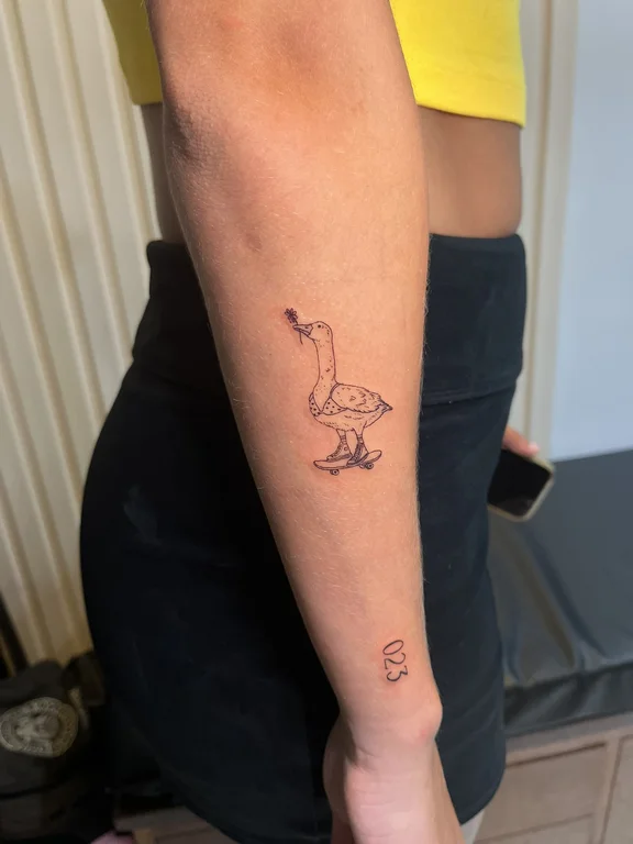animal minimalist snake fine line minimal linework elegant bold line tattoo Canggu Bali