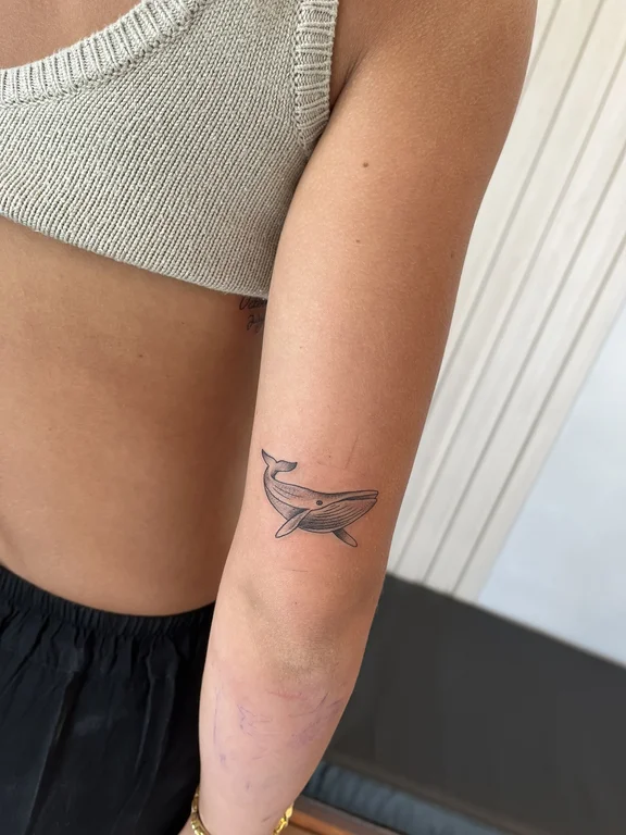 animal minimalist snake fine line minimal wave elegant bold line tattoo Canggu Bali