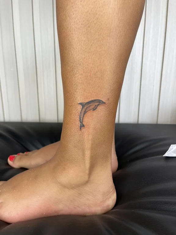 animal minimalist snake fine line minimal wave soft shading dotwork tattoo Canggu Bali