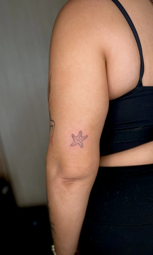 starfish woman hand arm sea minimalist small animal fineline fine line linework line tattoo tattoo canggu bali