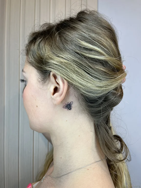 portrait minimalist woman fine line elegant soft shading minimal moon tattoo Canggu Bali