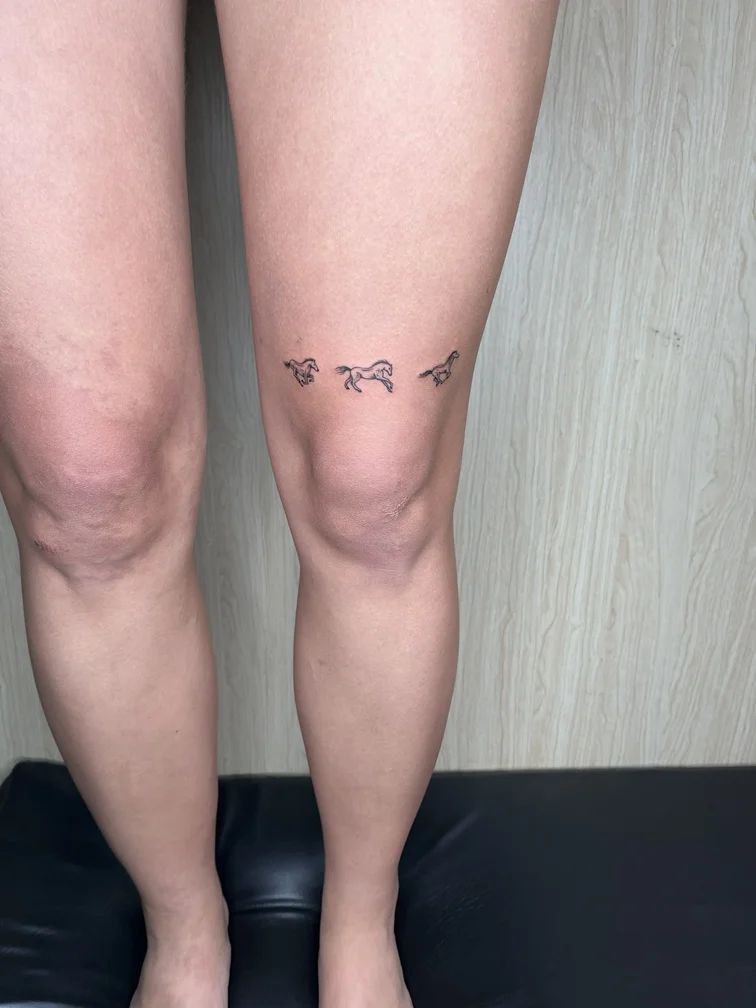 woman thigh horse black minimalist animal fine line fineline linework line tattoo canggu bali