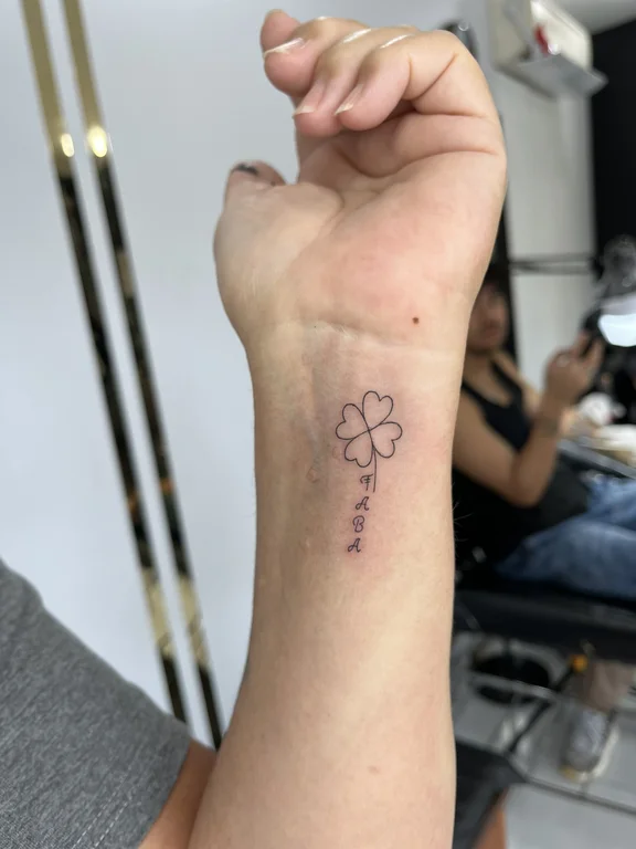 floral minimalist hand fine line flower minimal soft shading spiritual tattoo Canggu Bali