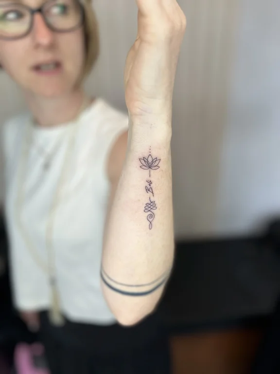 floral minimalist lotus fine line elegant minimal soft shading spiritual tattoo Canggu Bali