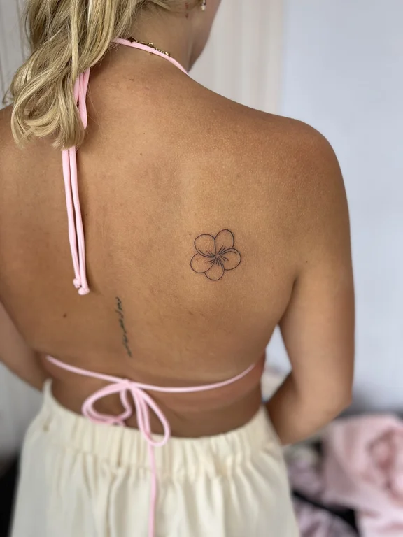 floral minimalist lotus fine line minimal elegant soft shading bold line tattoo Canggu Bali