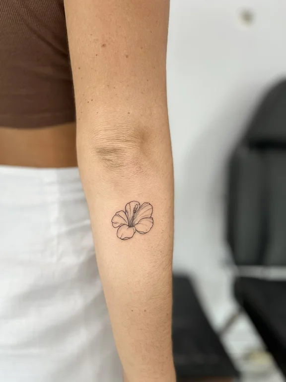 floral minimalist lotus fine line minimal soft shading linework elegant tattoo Canggu Bali
