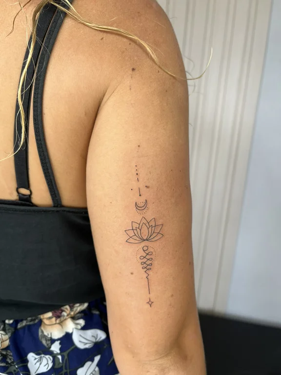 floral minimalist lotus fine line spiritual elegant dotwork minimal tattoo Canggu Bali