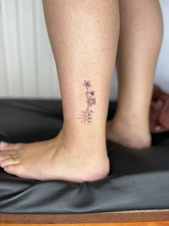 floral minimalist peony fine line minimal soft shading elegant linework tattoo Canggu Bali