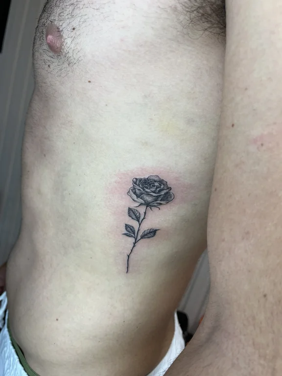 floral minimalist rose black grey minimal dotwork soft shading fine line tattoo Canggu Bali