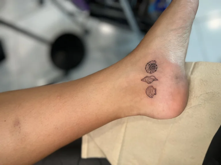 floral minimalist rose dotwork elegant soft shading fine line minimal tattoo Canggu Bali