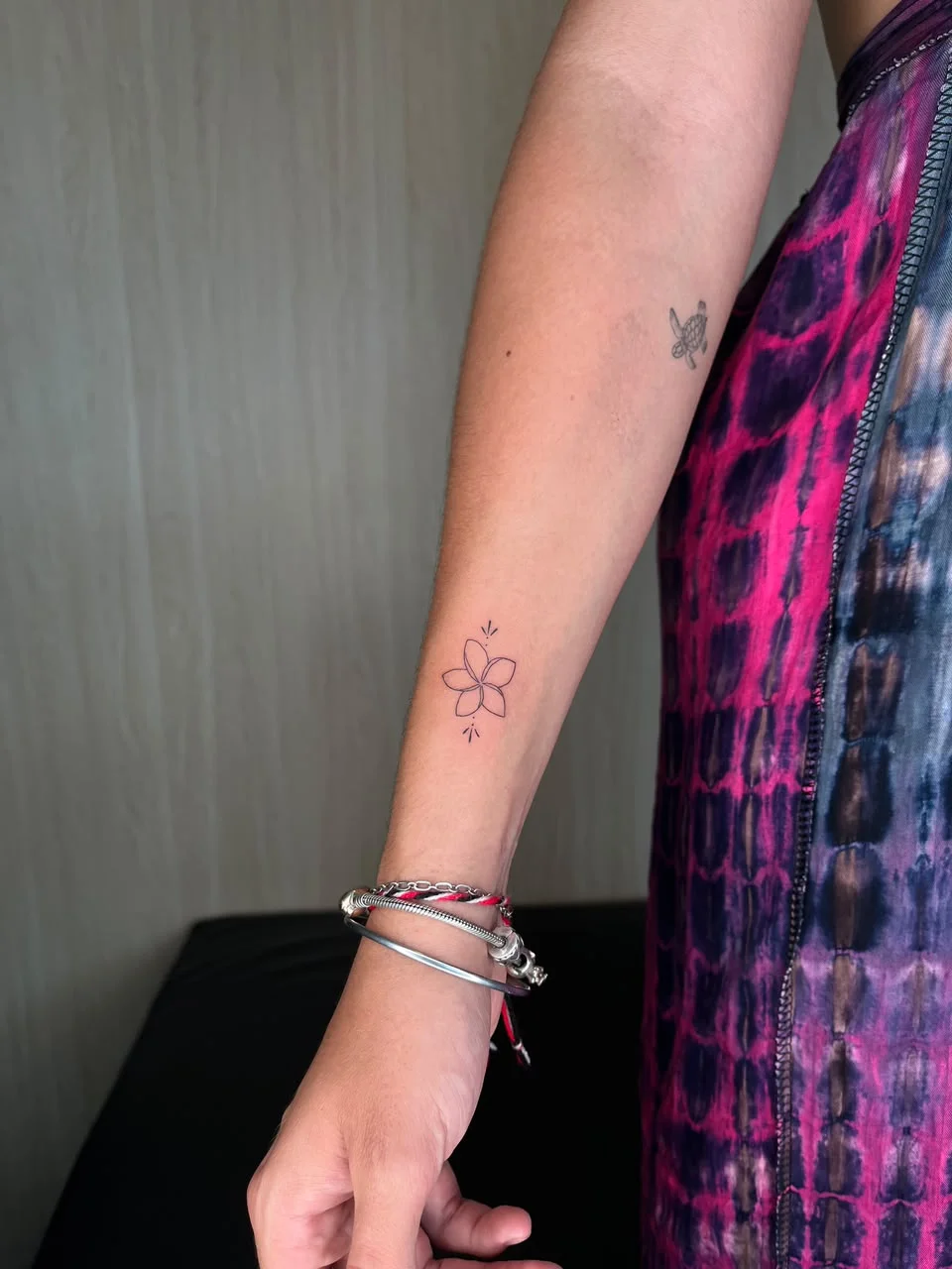 woman hand flower minimalist fine line line work line tattoo canggu bali