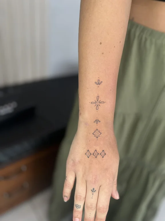 geometric minimalist hand fine line minimal elegant spiritual dotwork tattoo Canggu Bali