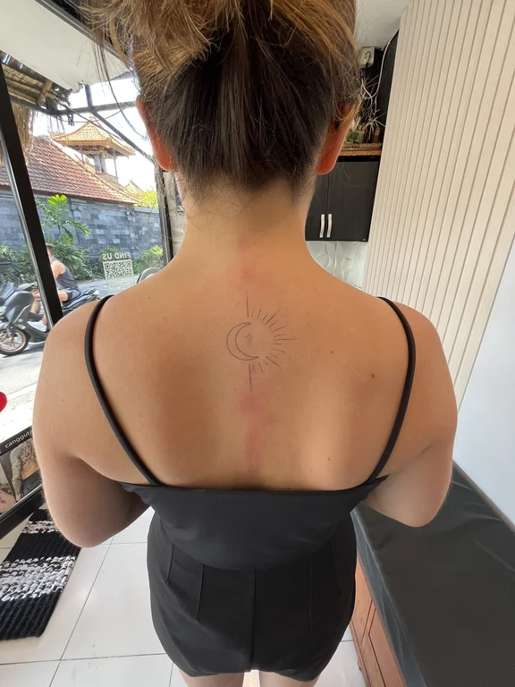 geometric minimalist woman fine line elegant thin line bold line minimal tattoo Canggu Bali