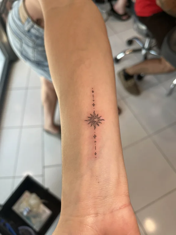 geometric minimalist woman fine line minimal dotwork soft shading elegant tattoo Canggu Bali