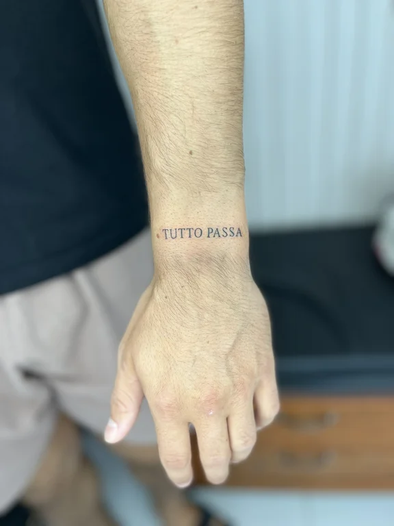lettering minimalist hand fine line minimal man thin line soft shading tattoo Canggu Bali
