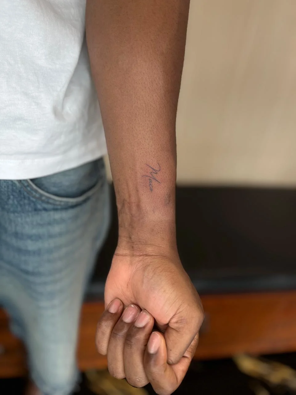 man hand small minimalist lettering fine line line work line tattoo canggu bali