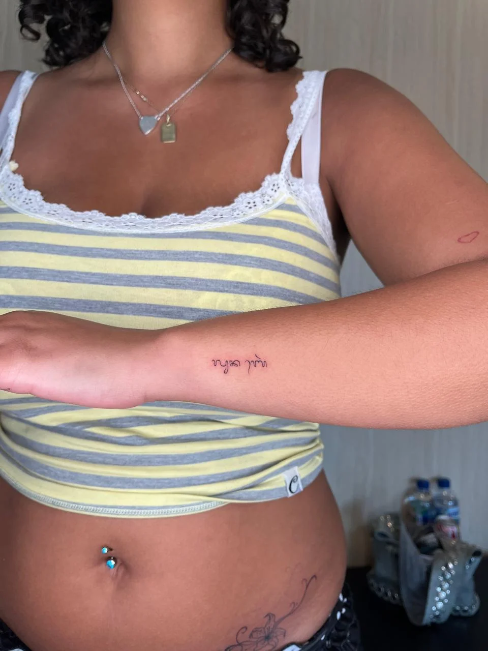 woman hand small lettering minimalist fine line line work line tattoo canggu bali