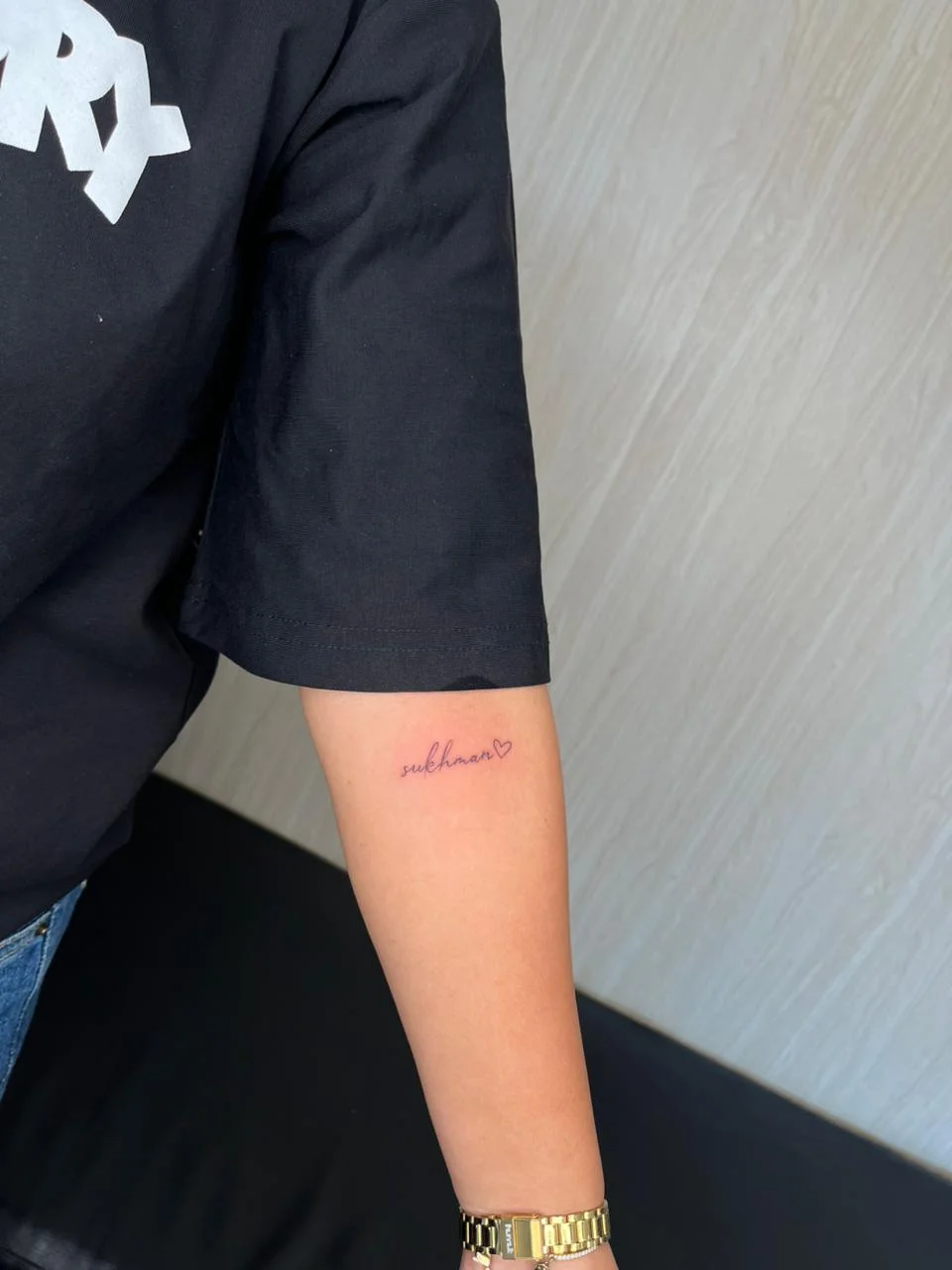 woman hand small minimalist lettering fine line line work line tattoo canggu bali