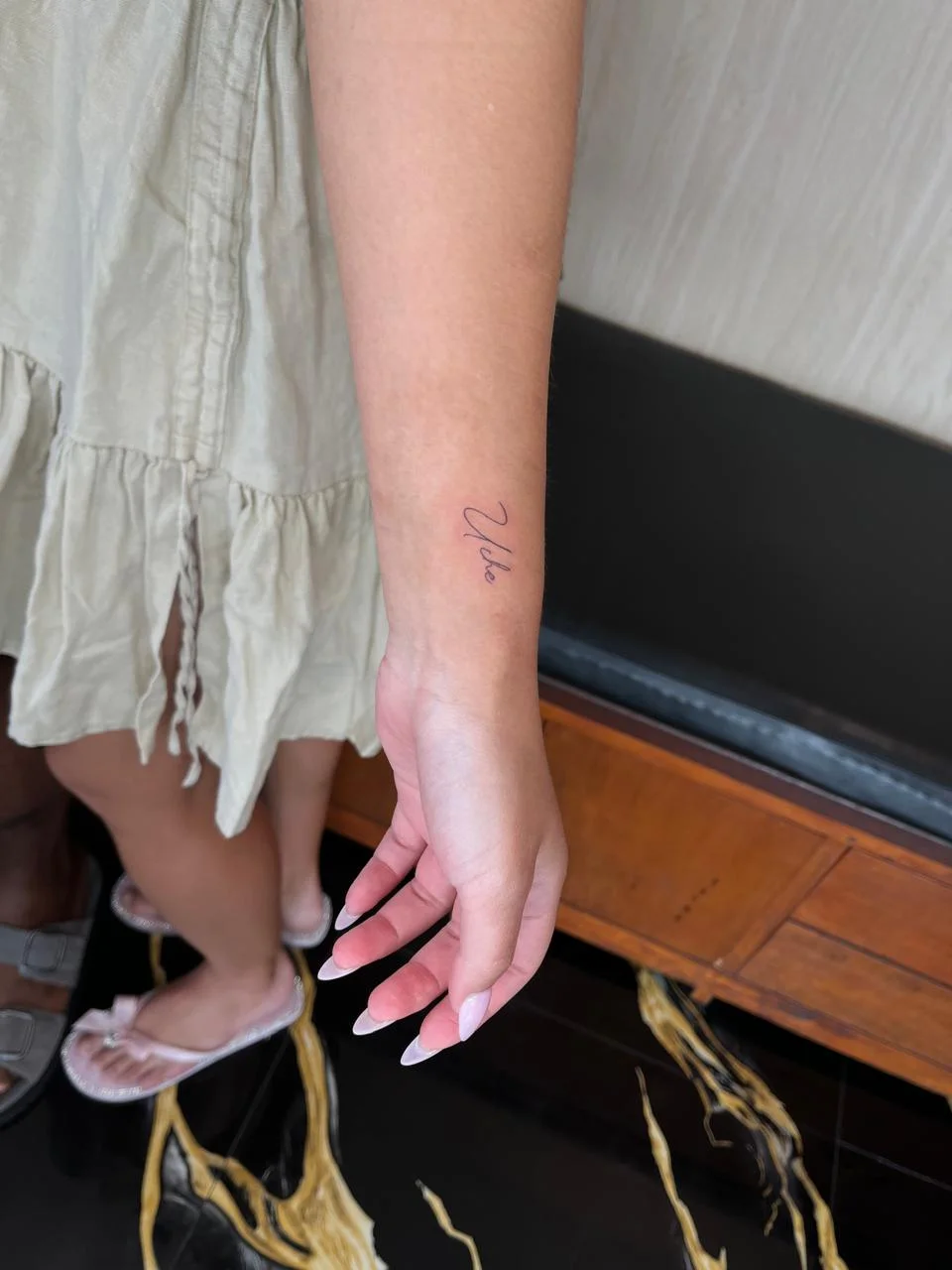 woman hand small minimalist lettering fine line line work line tattoo canggu bali