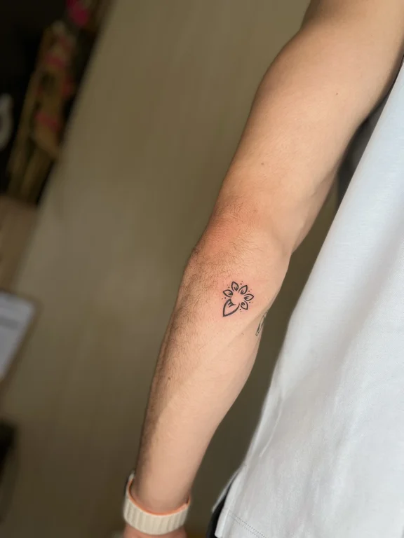 geometric minimalist rose dotwork minimal elegant fine line soft shading tattoo Canggu Bali