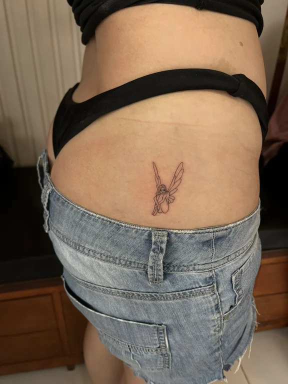 animal minimalist phoenix fine line minimal soft shading elegant linework tattoo Canggu Bali