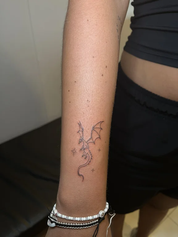 abstract minimalist snake fine line elegant dotwork dragon minimal tattoo Canggu Bali