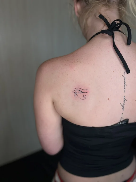 abstract minimalist woman fine line minimal elegant bold line wave tattoo Canggu Bali