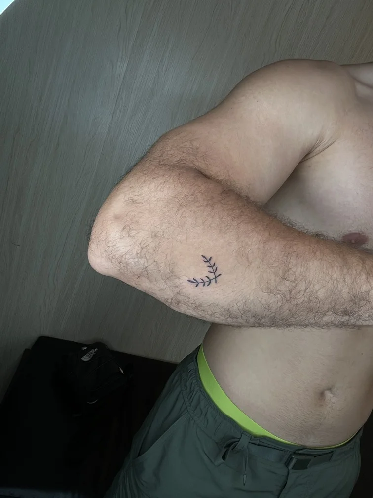 leaf man hand minimalist nature tattoo linework fineline black tattoo canggu bali