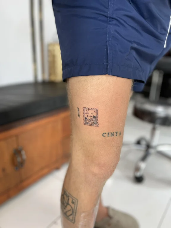 portrait minimalist man fine line minimal cloud bold line soft shading tattoo Canggu Bali
