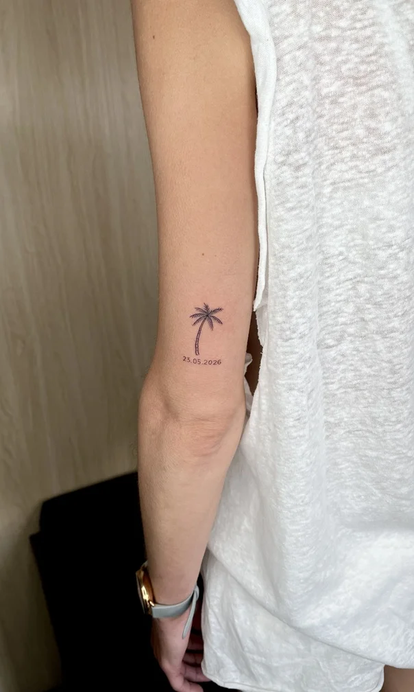 man hand nature coconut tree minimalist small fineline fine line linework line tattoo canggu bali