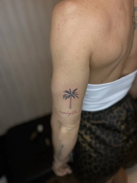 nature minimalist man soft shading minimal wave fine line sun tattoo Canggu Bali