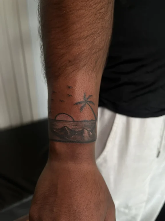 nature minimalist man soft shading wave sun fine line heavy shading tattoo Canggu Bali