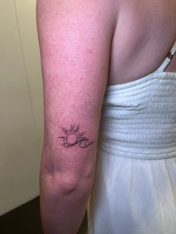 floral minimalist woman dotwork sun moon fine line minimal tattoo Canggu Bali