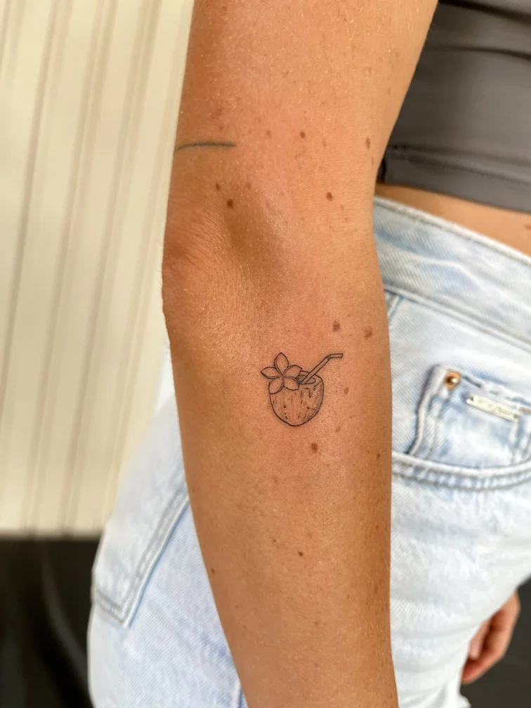 woman hand coconut nature minimalist fine line line work shading tattoo canggu bali