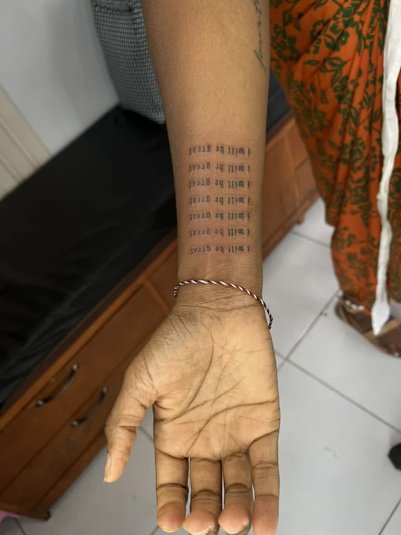 religious minimalist hand fine line spiritual minimal elegant thin line tattoo Canggu Bali